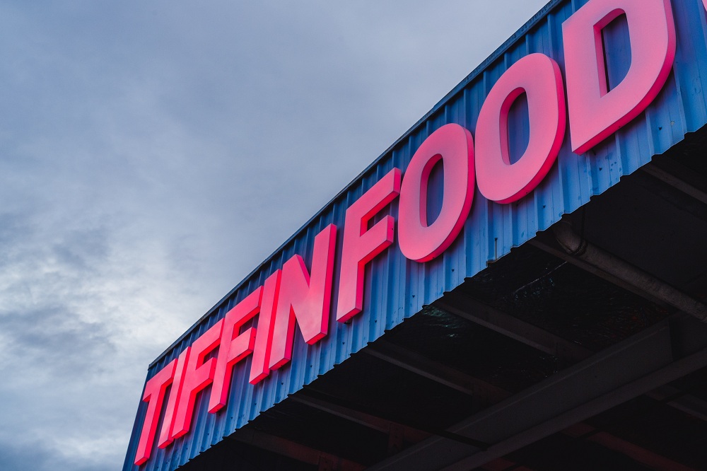Tiffin The former electronics manufacturing warehouse was transformed into a tasteful neon-wrapped food court.